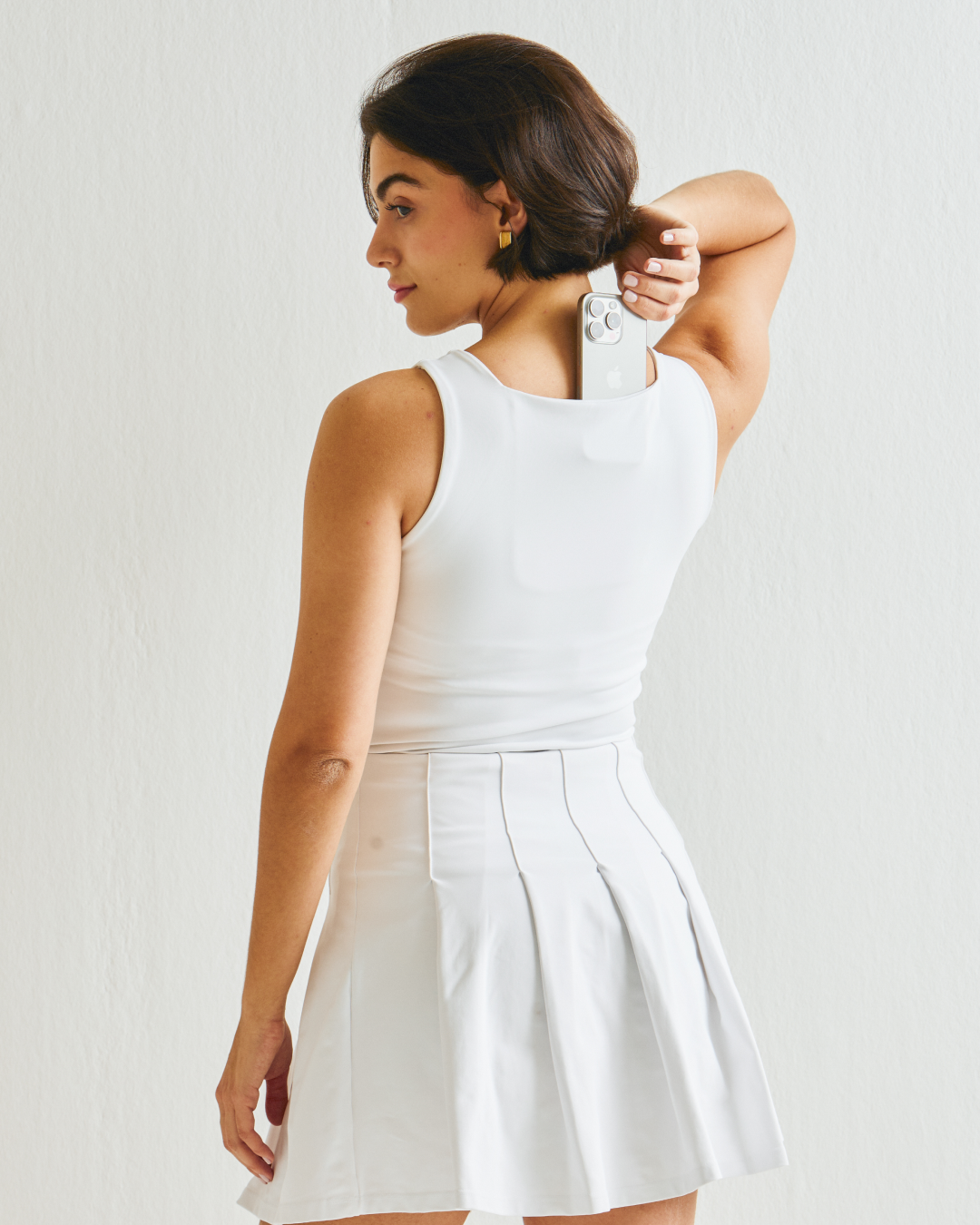 Top Tank French feminino branco com bolso traseiro